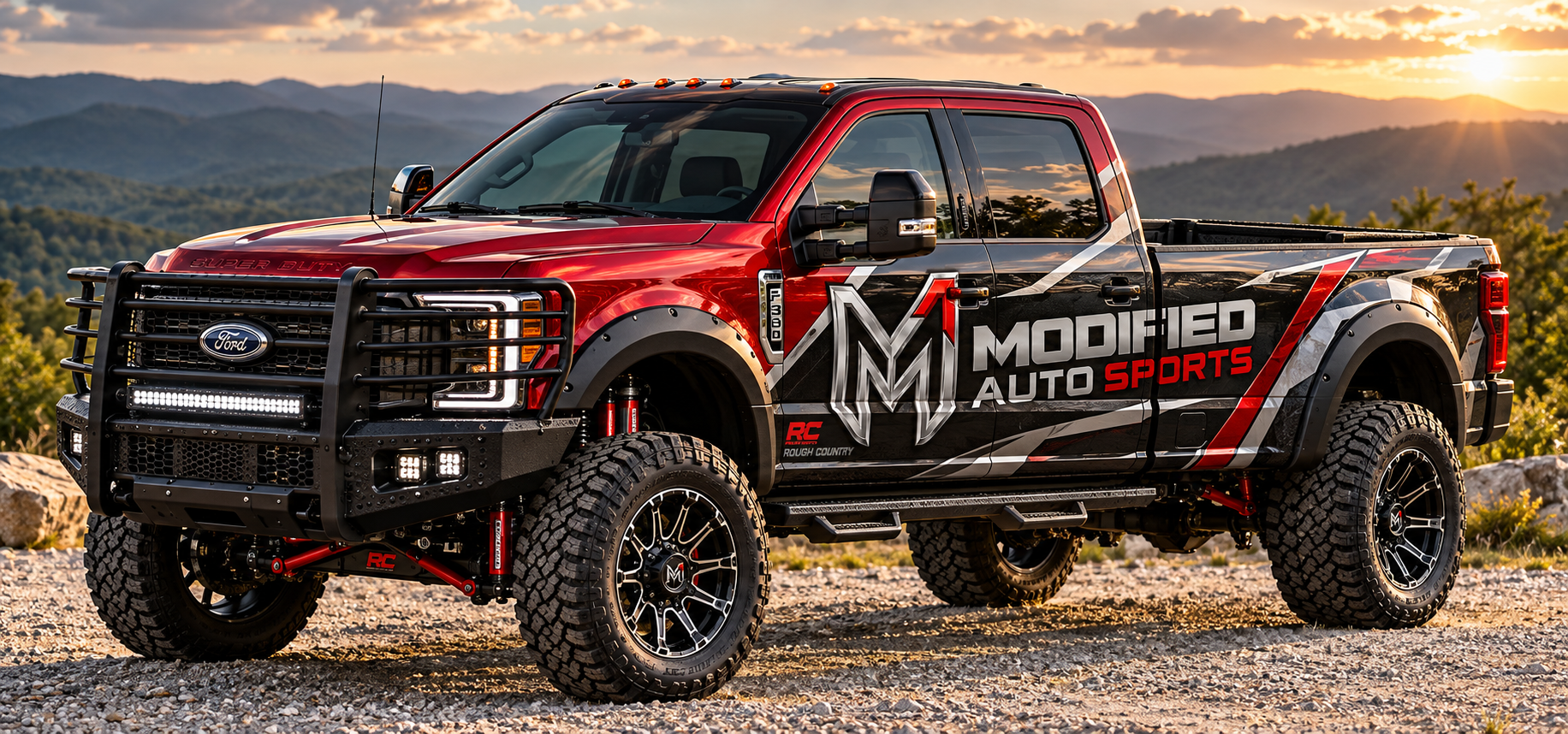Modified Auto Sports branded Ford truck artwork against a mountain sunset
